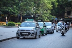 Taxi truyền thống mong muốn "lột xác" thành xe hợp đồng điện tử như Grab